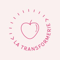 A simple line drawing of an apple is surrounded by the words "LA TRANSFORMERIE" in a circular layout, with pink lines radiating outward on a light background.